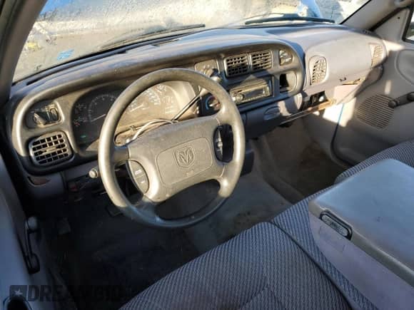 2000 Dodge 1500 z VIN 3B7HC12Z9YG128045, wystawiony jako Copart lot #72094865 z przebiegiem 136 887 mil mil oraz Szkoda całkowita • Salvage title. Historia ofert i sprzedaży dostępna na DreamBid. Obrazek 8.