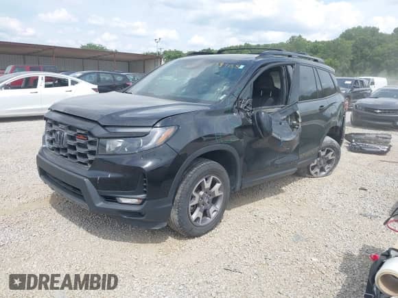 2023 Honda Passport TrailSport с VIN 5FNYF8H63PB028394, выставлен на аукционе IAAI как лот 42899138 с пробегом 65 272 миль миль и . История ставок и продаж доступна на DreamBid. Изображение 2.