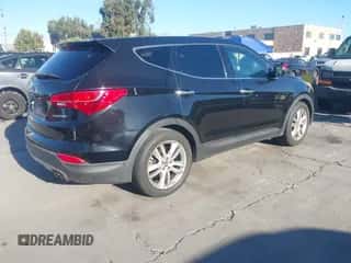 2013 Hyundai Santa Fe Sport z VIN 5XYZW3LA9DG005127, wystawiony jako IAAI lot #43570132 z przebiegiem 86 596 mil mil oraz . Historia ofert i sprzedaży dostępna na DreamBid. Obrazek 4.