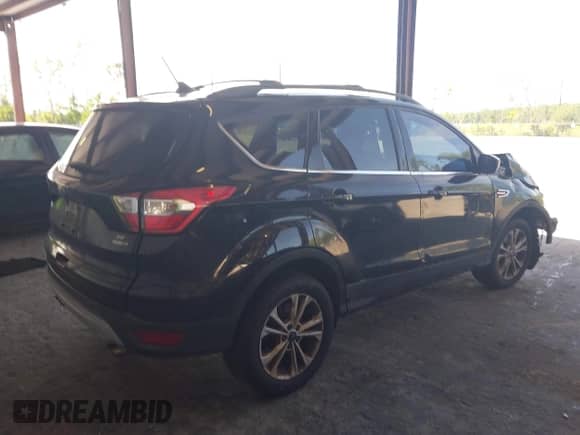 2018 Ford Escape SE с VIN 1FMCU9GD9JUB36647, выставлен на аукционе IAAI как лот 42751751 с пробегом 153 340 миль миль и . История ставок и продаж доступна на DreamBid. Изображение 4.