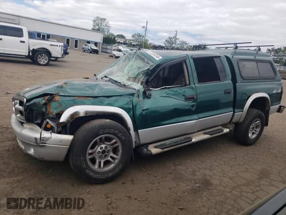 2003 Dodge Dakota SLT z VIN 1D7HG48N73S239498, wystawiony jako Copart lot #57225245 z przebiegiem Nie podano mil oraz Szkoda całkowita • Salvage title. Historia ofert i sprzedaży dostępna na DreamBid. Obrazek 1.