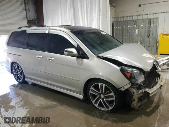 2007 Honda Odyssey EX-L z VIN 5FNRL38607B407210, wystawiony jako Copart lot #63808465 z przebiegiem 219 624 mil mil oraz Szkoda całkowita • Salvage title. Historia ofert i sprzedaży dostępna na DreamBid. Obrazek 4.