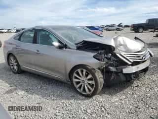 2012 Hyundai Azera с VIN KMHFH4JG3CA002048, выставлен на аукционе Copart как лот 70003314 с пробегом 120 238 миль миль и Списание • Salvage title. История ставок и продаж доступна на DreamBid. Изображение 4.