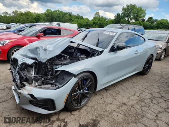 2022 BMW 4 Series M440i xDrive с VIN WBA13AR02NCJ20597, выставлен на аукционе Copart как лот 62574785 с пробегом Не указан миль и Списание • Salvage title. История ставок и продаж доступна на DreamBid. Изображение 1.