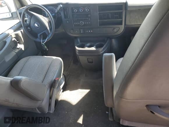 2012 Chevrolet Express Passenger 1LT с VIN 1GAZG1FG6C1186289, выставлен на аукционе Copart как лот 58240754 с пробегом 63 816 миль миль и Списание • Salvage title. История ставок и продаж доступна на DreamBid. Изображение 8.