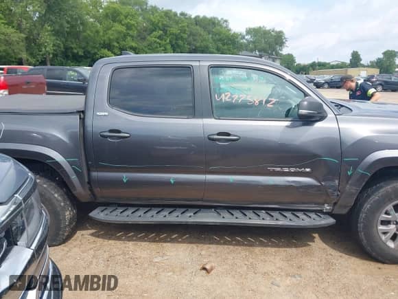 2018 Toyota Tacoma SR5 with VIN 5TFAZ5CN2JX061728, listed as a IAAI auction lot 42775812 with 119,408 mi miles and . Bid and sale history available at DreamBid. Image 13.