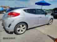 2012 Hyundai Veloster w/Red Int z VIN KMHTC6ADXCU036716, wystawiony jako Copart lot #63408115 z przebiegiem 144 117 mil mil oraz Szkoda całkowita • Salvage title. Historia ofert i sprzedaży dostępna na DreamBid. Obrazek 3.