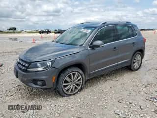 2014 Volkswagen Tiguan SEL with VIN WVGAV3AX7EW506170, listed as a Copart auction lot 58852355 with 55,961 mi miles and Salvage title. Bid and sale history available at DreamBid. Image 1.