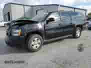 2009 Chevrolet Suburban 1LT z VIN 1GNFC26J69R253420, wystawiony jako Copart lot #78387524 z przebiegiem 189 009 mil mil oraz Szkoda całkowita • Salvage title. Historia ofert i sprzedaży dostępna na DreamBid. Obrazek 1.