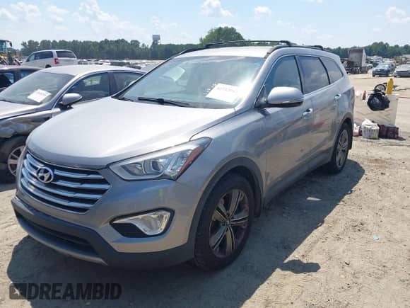 2015 Hyundai Santa Fe Limited with VIN KM8SN4HF6FU111062, listed as a IAAI auction lot 42732943 with 165,270 mi miles and . Bid and sale history available at DreamBid. Image 2.