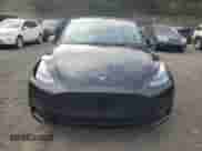 2023 Tesla Model Y Performance with VIN 7SAYGDEF0PF808883, listed as a Copart auction lot 82106605 with 22,706 mi miles and Salvage title. Bid and sale history available at DreamBid. Image 5.