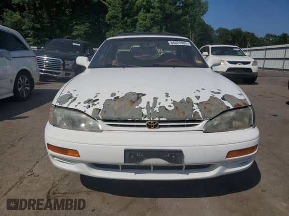 1995 Toyota Camry XLE с VIN 4T1GK13E8SU102000, выставлен на аукционе Copart как лот 64025905 с пробегом 115 606 миль миль и Чистый • Clean title. История ставок и продаж доступна на DreamBid. Изображение 5.