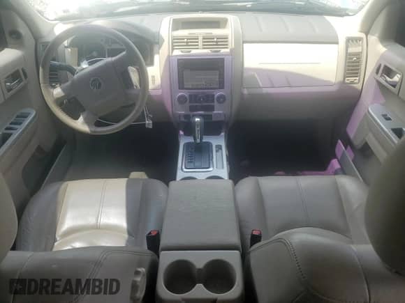 2008 Mercury Mariner Premier with VIN 4M2CU97138KJ12158, listed as a Copart auction lot 67723145 with 132,629 mi miles and Salvage title. Bid and sale history available at DreamBid. Image 8.