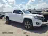 2016 Chevrolet Colorado 4WD LT z VIN 1GCHTCE35G1366054, wystawiony jako Copart lot #61624905 z przebiegiem 44 715 mil mil oraz Szkoda całkowita • Salvage title. Historia ofert i sprzedaży dostępna na DreamBid. Obrazek 4.