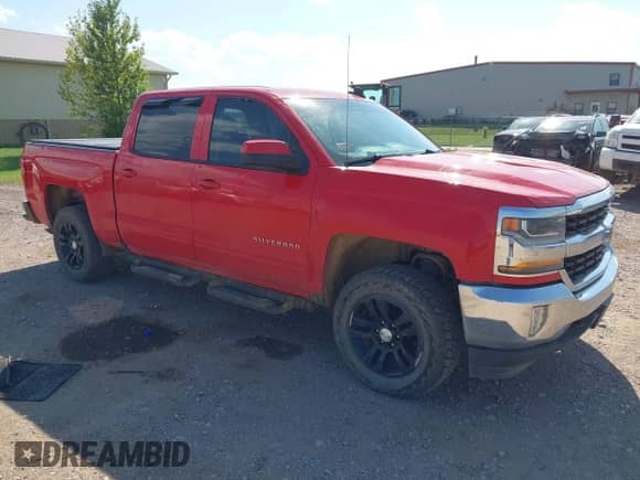 2018 Chevrolet Silverado 1500 LT with VIN 3GCUKREC7JG406986, listed as a IAAI auction lot 42928709 with 177,395 mi miles and . Bid and sale history available at DreamBid. Image 1.