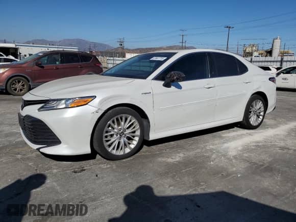 2019 Toyota Camry Hybrid LE с VIN 4T1B21HK2KU512669, выставлен на аукционе Copart как лот 67447715 с пробегом 141 772 миль миль и Списание • Salvage title. История ставок и продаж доступна на DreamBid. Изображение 1.