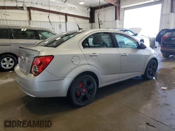 2014 Chevrolet Sonic LTZ with VIN 1G1JE5SB9E4200899, listed as a Copart auction lot 56039625 with 98,102 mi miles and Non repairable. Bid and sale history available at DreamBid. Image 3.