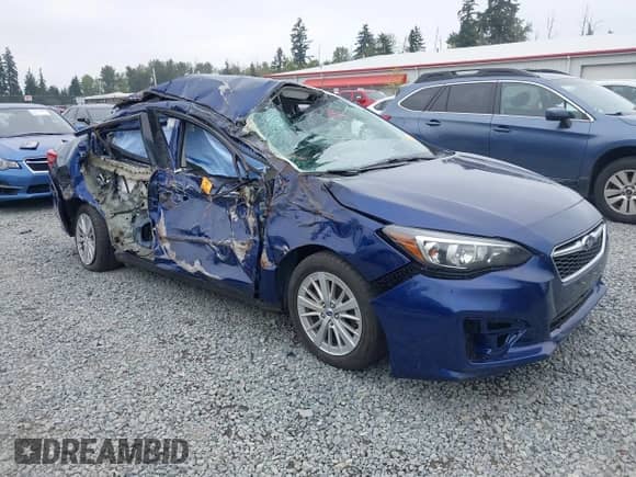 2017 Subaru Impreza Premium with VIN 4S3GKAB67H3622590, listed as a IAAI auction lot 43090070 with 74,876 mi miles and . Bid and sale history available at DreamBid. Image 1.