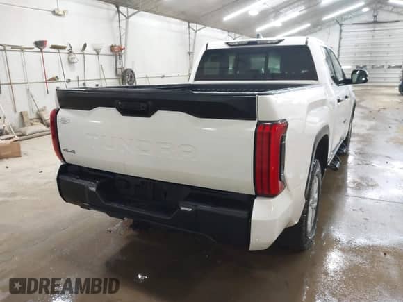 2023 Toyota Tundra SR5 z VIN 5TFLA5DAXPX063554, wystawiony jako IAAI lot #41943423 z przebiegiem 82 823 mil mil oraz . Historia ofert i sprzedaży dostępna na DreamBid. Obrazek 16.