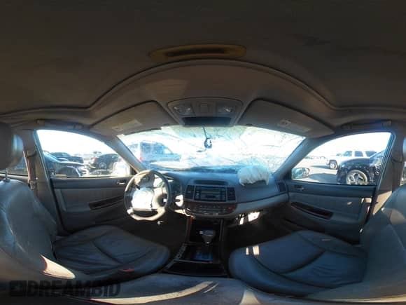 2002 Toyota Camry LE z VIN 4T1BF30K12U540118, wystawiony jako IAAI lot #43395483 z przebiegiem Nie podano mil oraz . Historia ofert i sprzedaży dostępna na DreamBid. Obrazek 19.
