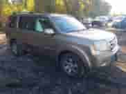 2009 Honda Pilot Touring with VIN 5FNYF48979B007005, listed as a IAAI auction lot 43454497 with 128,268 mi miles and . Bid and sale history available at DreamBid. Image 1.