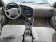 1996 Toyota Camry DX z VIN 4T1BG12K0TU771270, wystawiony jako Copart lot #64760345 z przebiegiem 198 961 mil mil oraz Nie do naprawy • Non repairable. Historia ofert i sprzedaży dostępna na DreamBid. Obrazek 8.