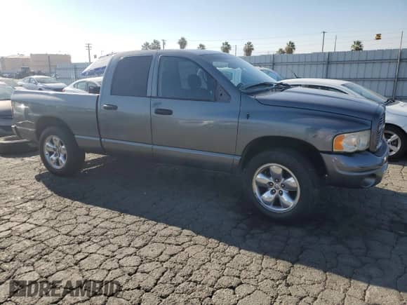 2004 Dodge 1500 SLT with VIN 1D7HA18D34S683552, listed as a Copart auction lot 68027505 with 197,774 mi miles and Salvage title. Bid and sale history available at DreamBid. Image 4.