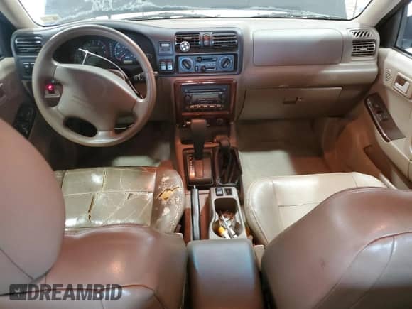2001 Honda Passport LX с VIN 4S6DM58W614408494, выставлен на аукционе Copart как лот 54152645 с пробегом 102 628 миль миль и Чистый • Clean title. История ставок и продаж доступна на DreamBid. Изображение 8.
