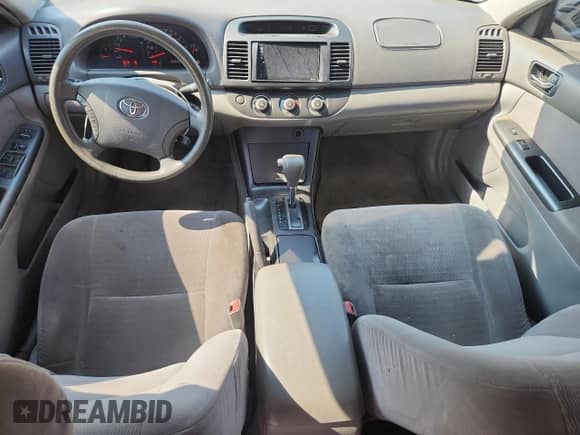 2006 Toyota Camry STD с VIN JTDBE32KX63057064, выставлен на аукционе Copart как лот 87117575 с пробегом 228 136 миль миль и Списание • Salvage title. История ставок и продаж доступна на DreamBid. Изображение 8.