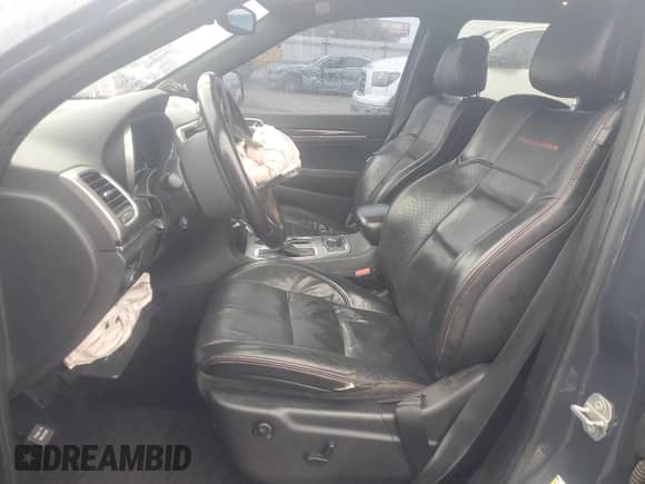 2018 Jeep Grand Cherokee Trailhawk with VIN 1C4RJFLT9JC270177, listed as a Copart auction lot 59732695 with 186,982 mi miles and Salvage title. Bid and sale history available at DreamBid. Image 7.