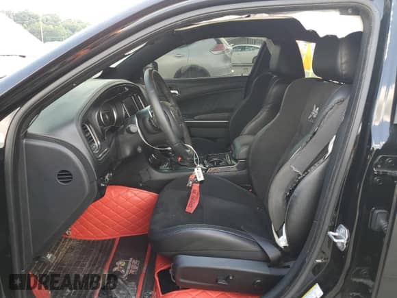 2023 Dodge Charger Scat Pack with VIN 2C3CDXGJXPH506728, listed as a Copart auction lot 67842285 with 16,932 mi miles and Salvage title. Bid and sale history available at DreamBid. Image 7.