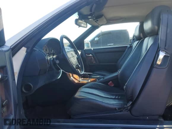 1992 Mercedes-Benz SL с VIN WDBFA66E7NF049065, выставлен на аукционе Copart как лот 82144064 с пробегом 90 848 миль миль и Чистый • Clean title. История ставок и продаж доступна на DreamBid. Изображение 7.