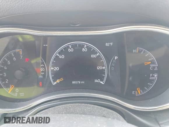 2020 Jeep Grand Cherokee Laredo E with VIN 1C4RJEAG2LC284912, listed as a IAAI auction lot 42114881 with 86,579 mi miles and . Bid and sale history available at DreamBid. Image 7.