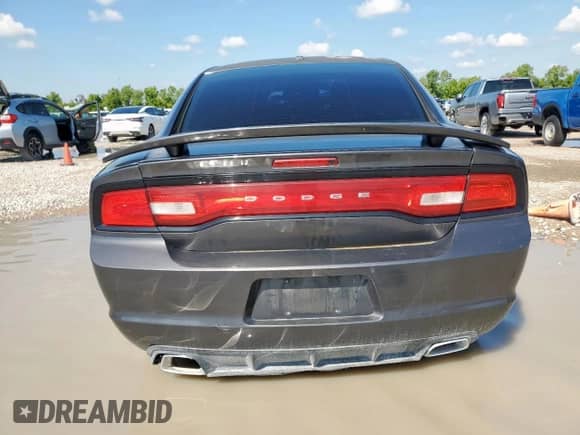 2014 Dodge Charger SE with VIN 2C3CDXBG5EH138158, listed as a Copart auction lot 71087935 with 181,738 mi miles and Salvage title. Bid and sale history available at DreamBid. Image 6.