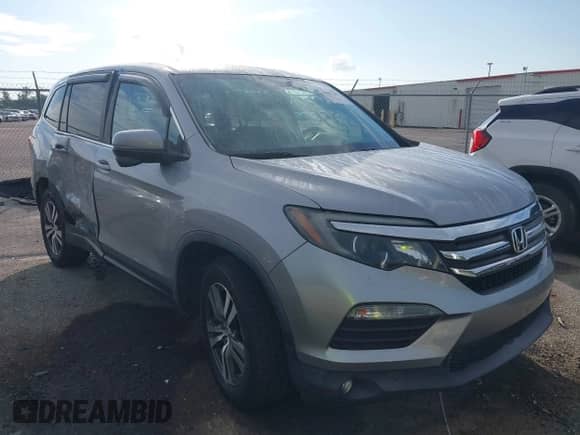 2018 Honda Pilot EX-L with VIN 5FNYF5H5XJB001545, listed as a IAAI auction lot 42865283 with 75,577 mi miles and . Bid and sale history available at DreamBid. Image 1.