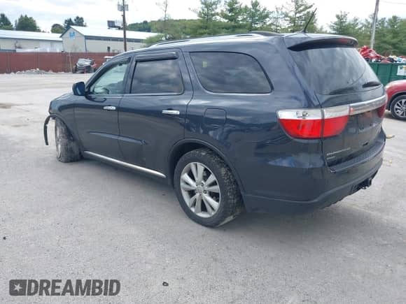 2013 Dodge Durango Crew with VIN 1C4RDJDG6DC690060, listed as a IAAI auction lot 43134968 with 160,833 mi miles and . Bid and sale history available at DreamBid. Image 3.