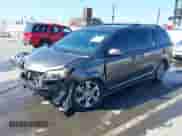 2012 Toyota Sienna SE with VIN 5TDXK3DCXCS233593, listed as a IAAI auction lot 41959611 with 85,558 mi miles and . Bid and sale history available at DreamBid. Image 18.