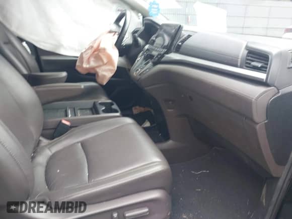 2020 Honda Odyssey EX-L with VIN 5FNRL6H73LB002480, listed as a IAAI auction lot 42615768 with 108,561 mi miles and . Bid and sale history available at DreamBid. Image 5.