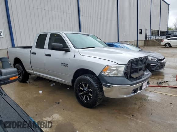 2014 Ram 1500 Tradesman with VIN 1C6RR7FG1ES204657, listed as a Copart auction lot 50946195 with 112,572 mi miles and Salvage title. Bid and sale history available at DreamBid. Image 4.