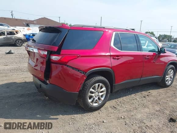 2019 Chevrolet Traverse LT z VIN 1GNEVHKW8KJ141247, wystawiony jako IAAI lot #42872355 z przebiegiem 104 324 mil mil oraz . Historia ofert i sprzedaży dostępna na DreamBid. Obrazek 4.