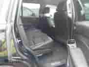 2018 Chevrolet Tahoe LT z VIN 1GNSKBKC9JR254896, wystawiony jako IAAI lot #42456940 z przebiegiem 102 459 mil mil oraz . Historia ofert i sprzedaży dostępna na DreamBid. Obrazek 8.