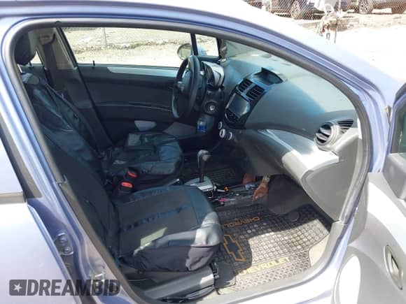 2014 Chevrolet Spark LT z VIN KL8CD6S92EC553229, wystawiony jako IAAI lot #43022432 z przebiegiem 122 373 mil mil oraz . Historia ofert i sprzedaży dostępna na DreamBid. Obrazek 5.