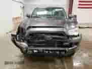 2018 Toyota Tacoma SR with VIN 5TFSX5EN4JX062063, listed as a Copart auction lot 47062045 with 96,087 mi miles and Salvage title. Bid and sale history available at DreamBid. Image 5.