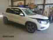 2013 Volkswagen Tiguan z VIN WVGCV3AXXDW570761, wystawiony jako Copart lot #51603655 z przebiegiem 119 932 mil mil oraz Czysty tytuł • Clean title. Historia ofert i sprzedaży dostępna na DreamBid. Obrazek 4.