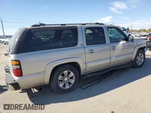 2004 Chevrolet Suburban LT z VIN 1GNFK16Z94J156657, wystawiony jako Copart lot #74087664 z przebiegiem 267 416 mil mil oraz Szkoda całkowita • Salvage title. Historia ofert i sprzedaży dostępna na DreamBid. Obrazek 3.