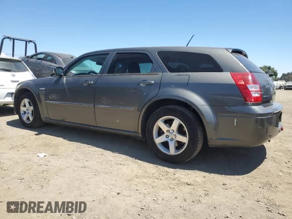 2008 Dodge Magnum SXT with VIN 2D4FV37V78H129071, listed as a Copart auction lot 64698115 with 127,442 mi miles and Salvage title. Bid and sale history available at DreamBid. Image 2.