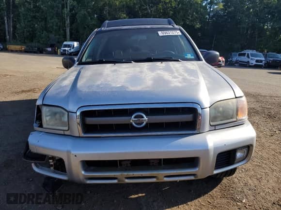 2003 Nissan Pathfinder SE z VIN JN8DR09Y03W809861, wystawiony jako Copart lot #65631275 z przebiegiem 132 716 mil mil oraz Szkoda całkowita • Salvage title. Historia ofert i sprzedaży dostępna na DreamBid. Obrazek 5.