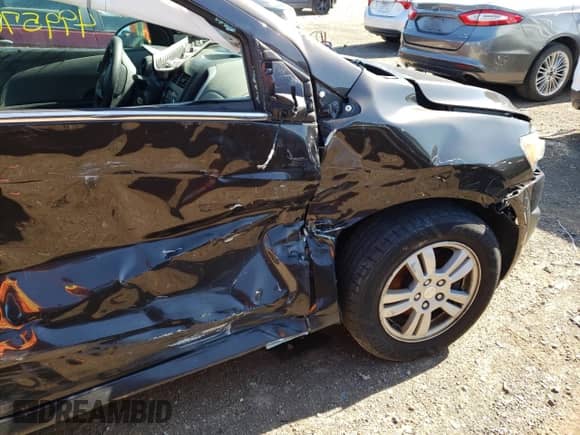 2014 Chevrolet Sonic LT with VIN 1G1JC5SH7E4239162, listed as a Copart auction lot 49957872 with Not provided miles and Salvage title. Bid and sale history available at DreamBid. Image 9.