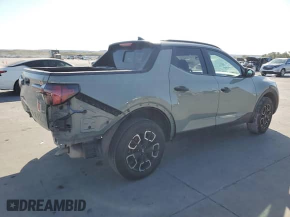 2022 Hyundai Santa Cruz SEL с VIN 5NTJCDAE0NH039356, выставлен на аукционе Copart как лот 76769524 с пробегом 17 247 миль миль и Списание • Salvage title. История ставок и продаж доступна на DreamBid. Изображение 3.