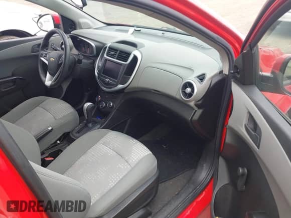 2020 Chevrolet Sonic LT with VIN 1G1JG6SB2L4115688, listed as a IAAI auction lot 42326438 with 33,871 mi miles and . Bid and sale history available at DreamBid. Image 5.